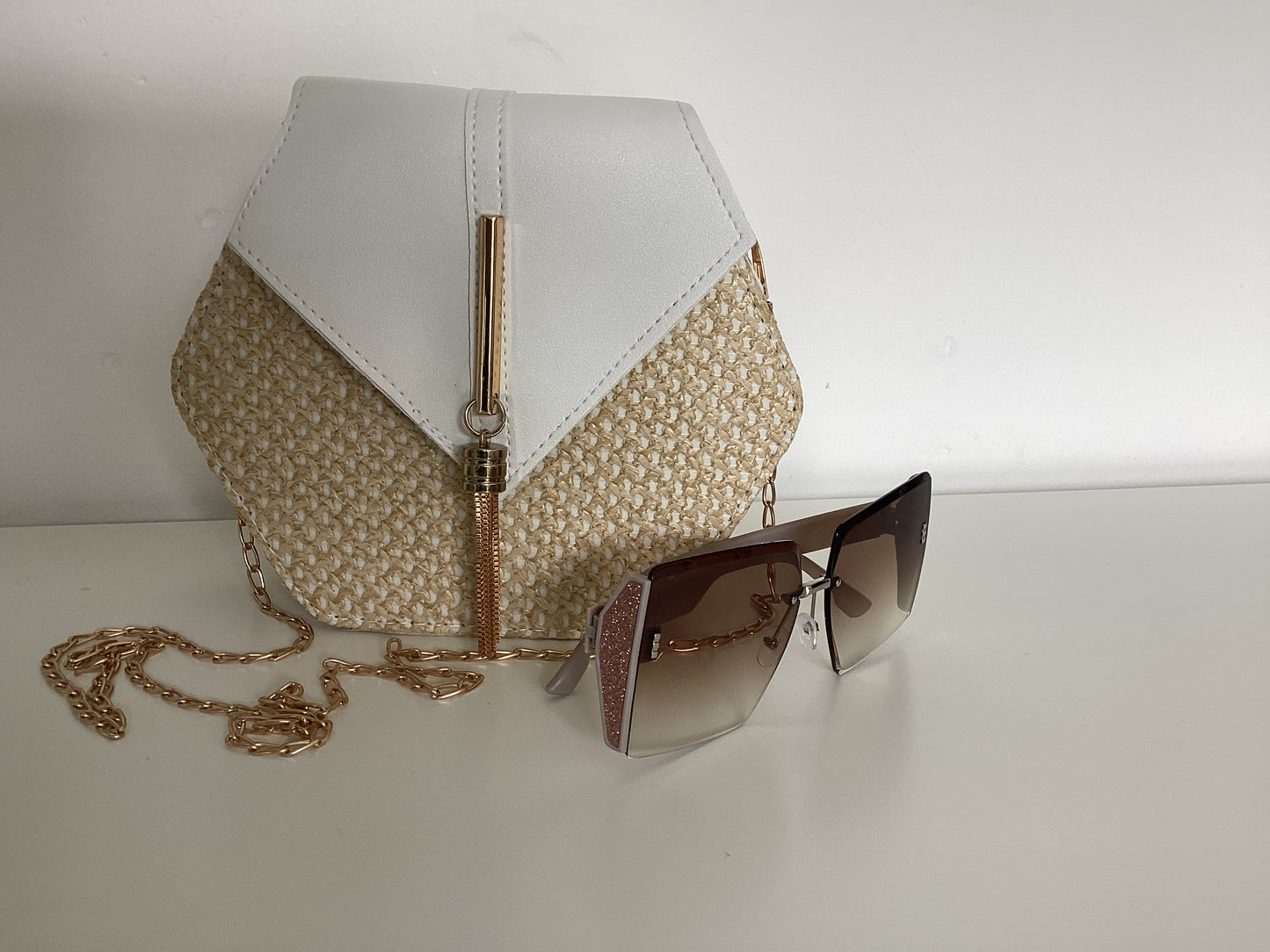 Hexagon straw crossover bag with large square sunglasses