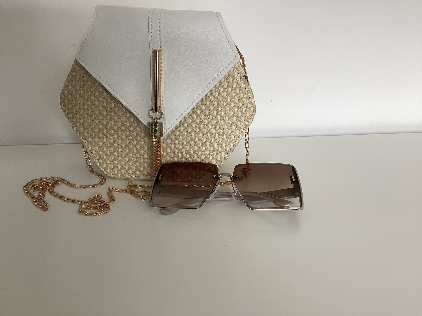 Hexagon straw crossover bag with large square sunglasses