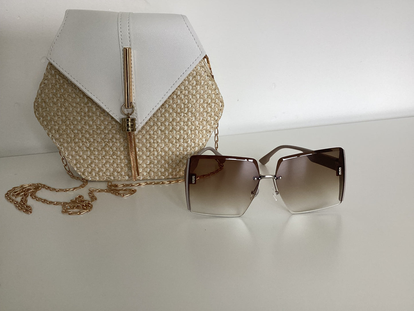 Hexagon straw crossover bag with large square sunglasses