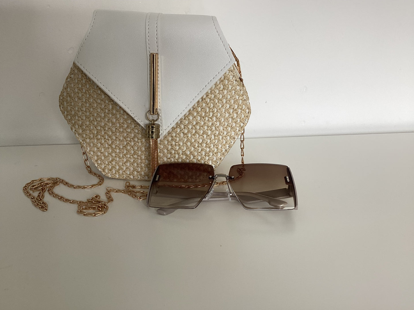 Hexagon straw crossover bag with large square sunglasses