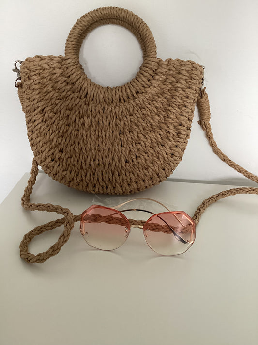 Handmade strawrattan half moon bag with handles and rose tint sunglasses