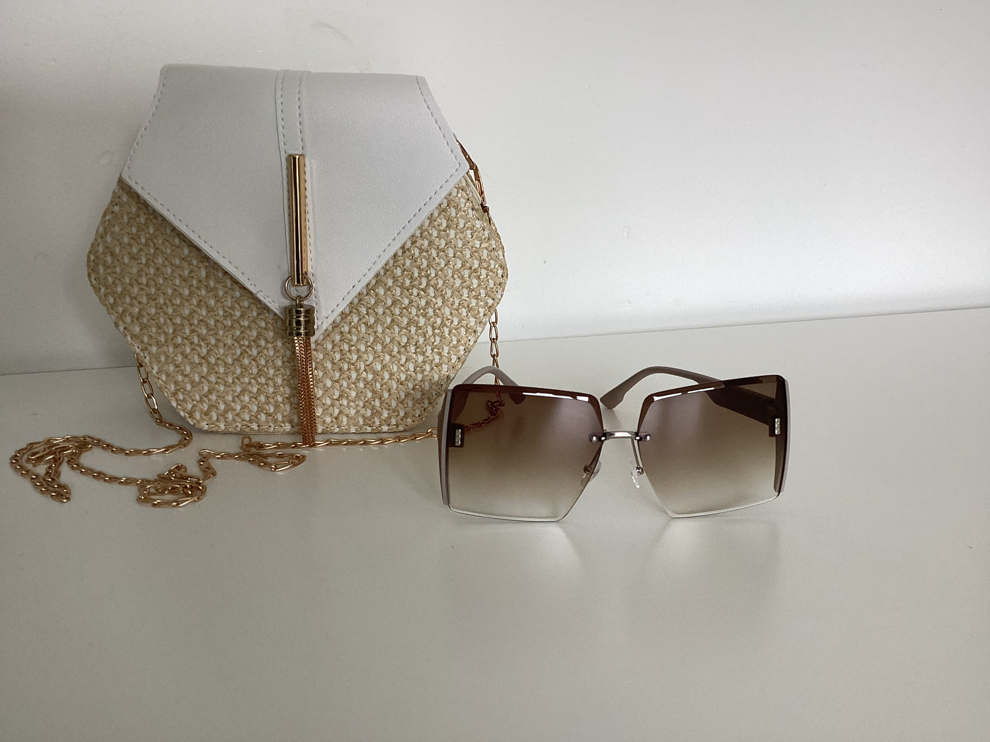 Hexagon straw crossover bag with large square sunglasses